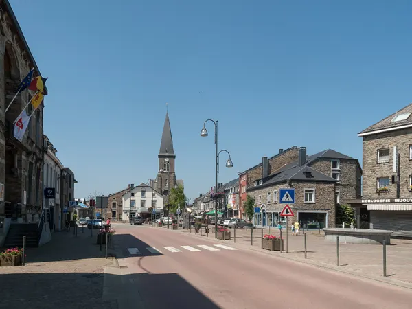 Paliseul., church (église Saint Eutrope) in the street