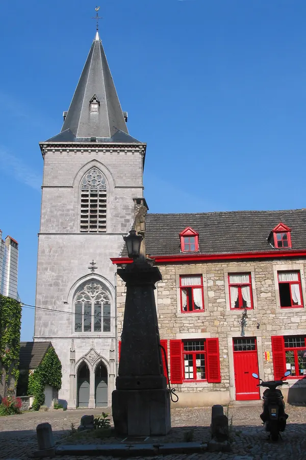 Limbourg (Belgium), the church of Saint George (XVth century) and the Holy Virgin water pump (XVIIth century).