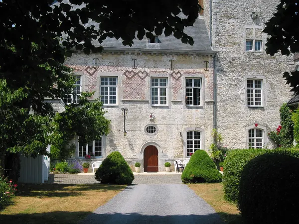 Villers-le-Temple (Belgium), old tower house with tower (XIVth century) and main building (XVIth century).