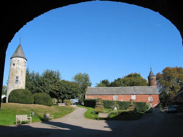 Oteppe (Belgium), internal courtyard, medieval tower and outbuilding of the castle.