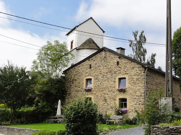 Saint Margaret's church and house in Ollomont, Nadrin, Houffalize, Belgium