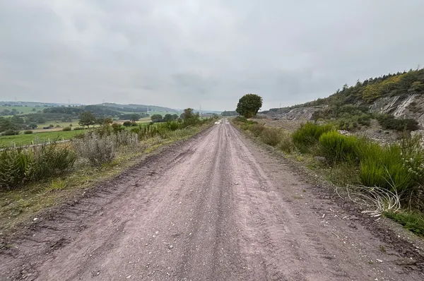 Track along the quarry Thier del Preu and recently built cycling path.