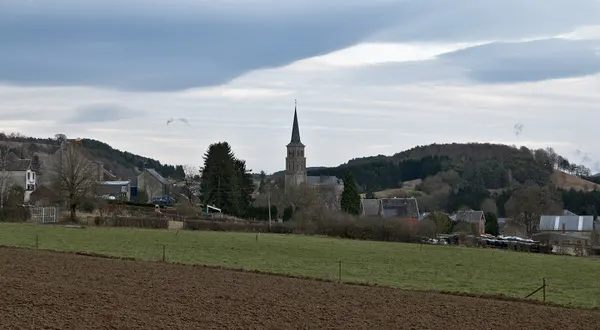 La Grande Traversée de la Forêt du Pays de Chimay (DSC 0801) Treignes and its church seen from a dirt road that leads to the…